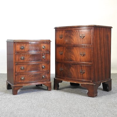 Lot 214 - A reproduction bow front bachelor's chest,...