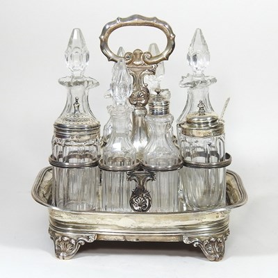 Lot 536 - A George II silver cruet stand, containing a...