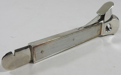 Lot 50 - A modern silver cigar cutter, with engine...