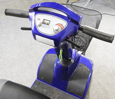 Lot 43 - A blue EGM electric mobility scooter, with...