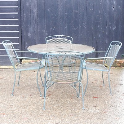 Lot 308 - A metal garden table, with a set of four...