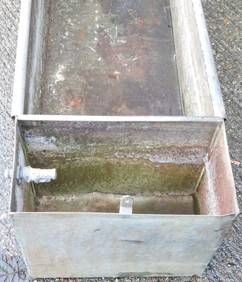 Lot 14 - A large galvanised trough, 182cm wide