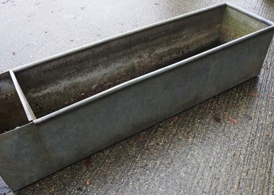 Lot 14 - A large galvanised trough, 182cm wide