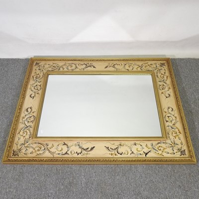 Lot 410 - A large cream painted floral wall mirror, 128...