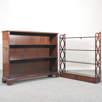 Lot 576 - A military style dwarf open bookcase, together...