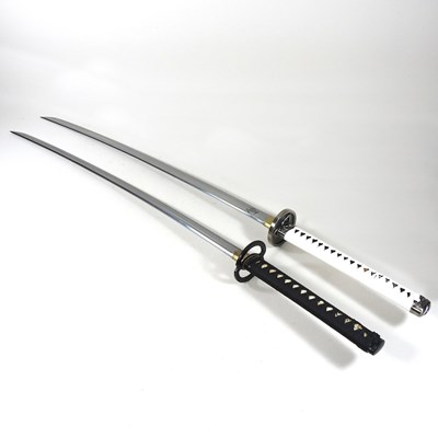 Lot 530 - A modern Japanese samurai style sword, 105cm...