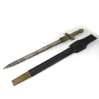 Lot 450 - A 19th century sawback sidearm, with gladius...