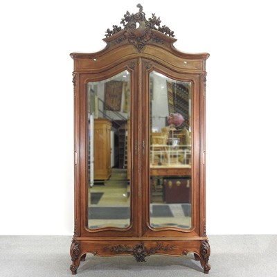 Lot 424 - An early 20th century French walnut armoire,...