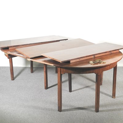 Lot 306 - A George III and later mahogany D end dining...