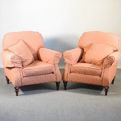 Lot 357 - A pair of peach upholstered armchairs, on...