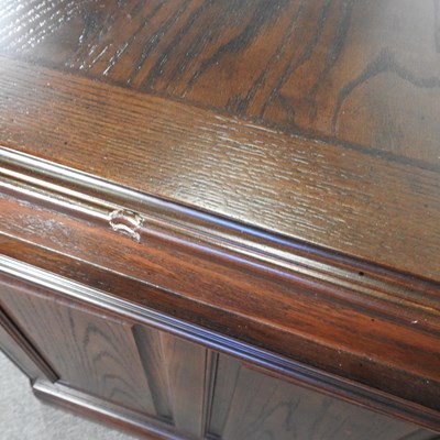 Lot 180 - A modern oak pedestal desk, on a plinth base