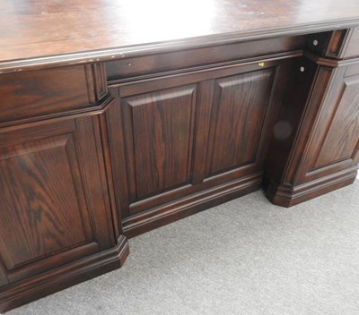 Lot 180 - A modern oak pedestal desk, on a plinth base