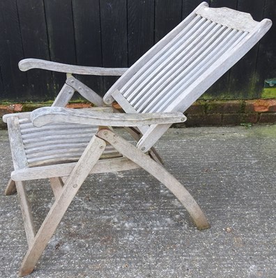 Lot 326 - A pair of Cannock Gates teak reclining garden chairs