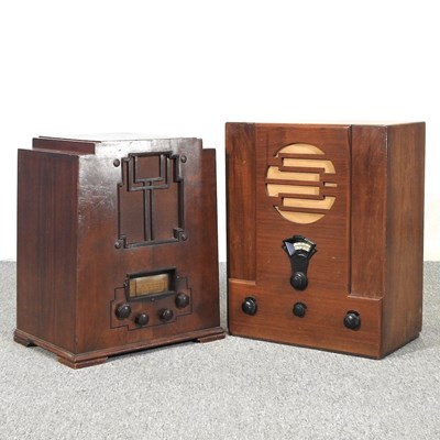 Lot 636 - A 1930's walnut cased valve radio, 49cm high,...