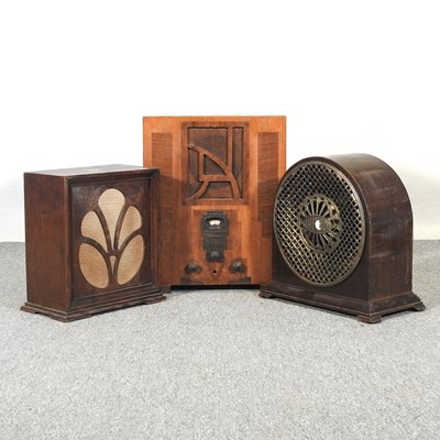 Lot 196 - A 1930's walnut cased valve radio, 51cm high,...