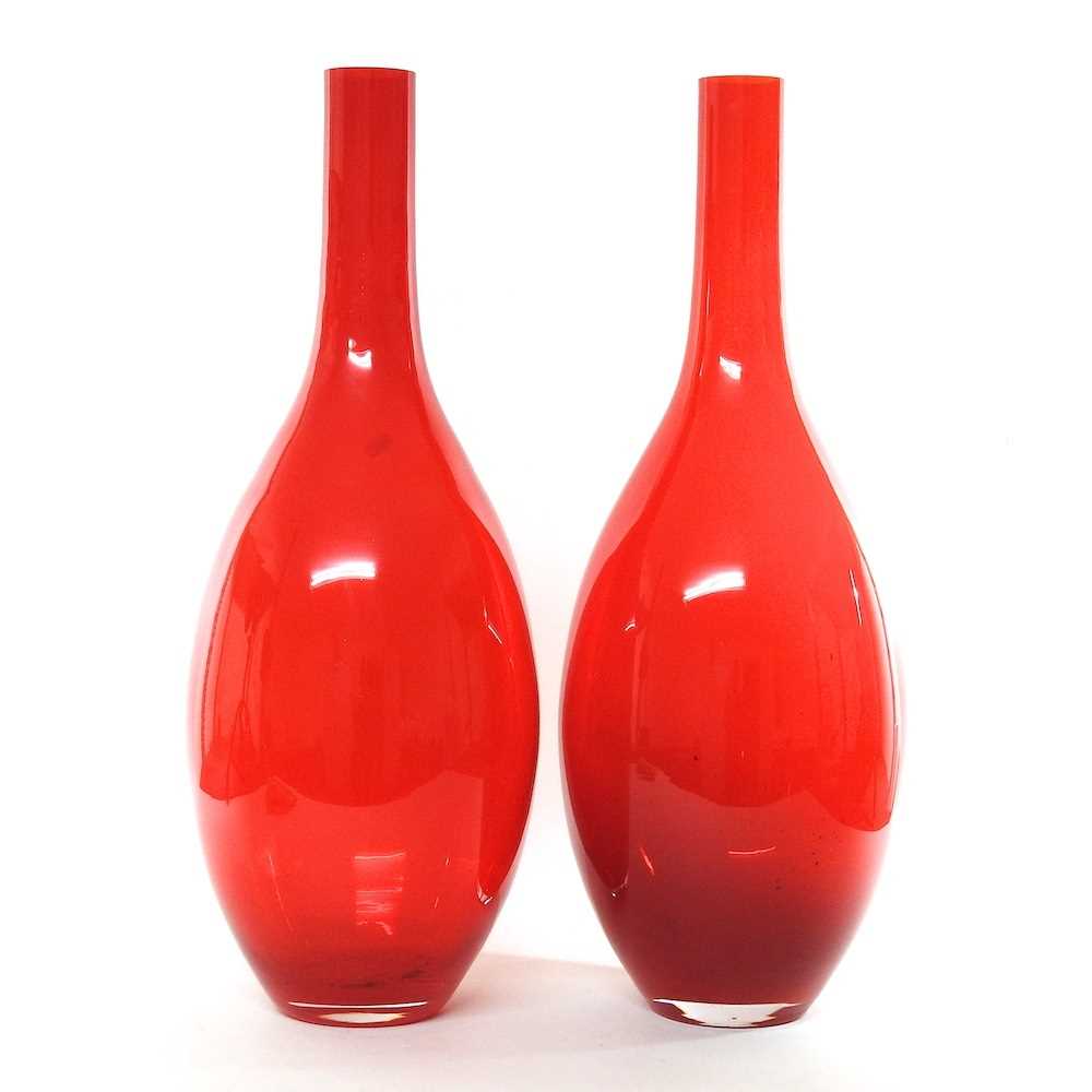 Lot 68 - A pair of tall modern orange glass vases, 70cm...