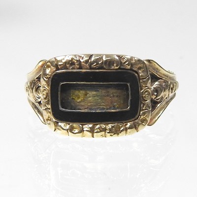 Lot 62 - A George IV enamelled mourning ring, with a...