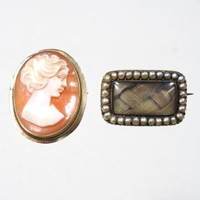 Lot 31 - A George III seed pearl mourning brooch, inset...