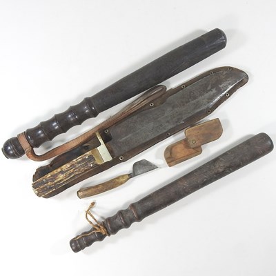 Lot 442 - A wooden truncheon, 39cm long, together with...