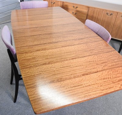 Lot 47 - A 1970's Nathan dining suite, comprising an...
