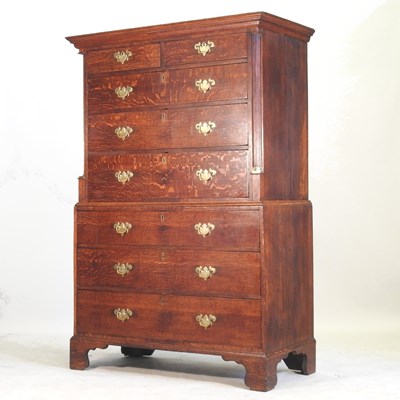 Lot 644 - A George III oak chest on chest