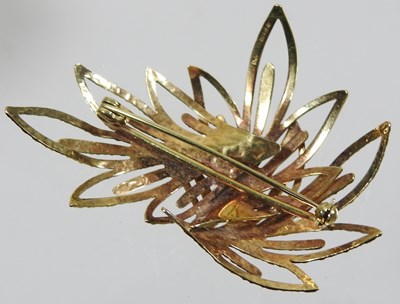 Lot 24 - A 14 carat rolled gold brooch, of openwork...