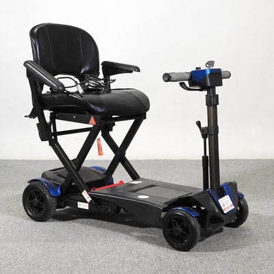Lot 63 - A blue automatic electric folding mobility...