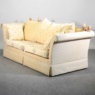Lot 397 - A modern yellow upholstered sofa, with loose...