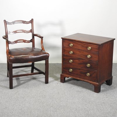 Lot 336 - A 19th century mahogany commode chest, with a...
