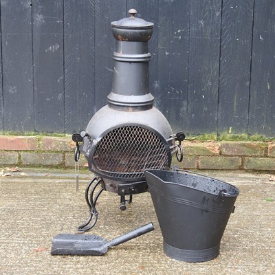 Lot 164 - A metal chiminea, 91cm high, together with a...