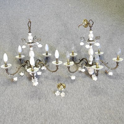 Lot 216 - A pair of white pottery and brass five branch chandeliers