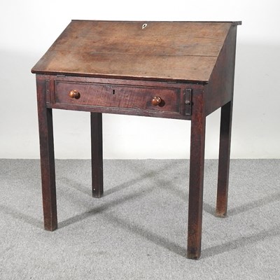 Lot 543 - A 19th century oak clerk's desk, with a fitted...