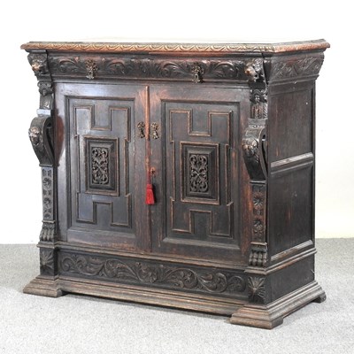 Lot 514 - An early 20th century continental carved oak...