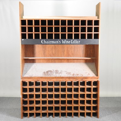 Lot 439 - A large floor standing light oak wine rack,...