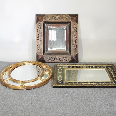 Lot 476 - A gilt oval gilt framed wall mirror, with a...