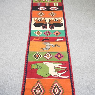 Lot 155 - A kelim runner, decorated with coloured panels...