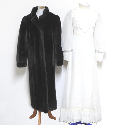 Lot 234 - An Astraka 1980's faux fur full length coat,...