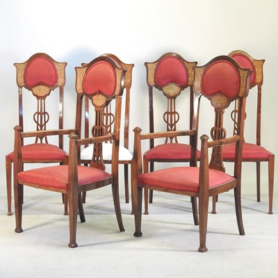 Lot 334 - A set of six Art Nouveau inlaid mahogany high back dining chairs