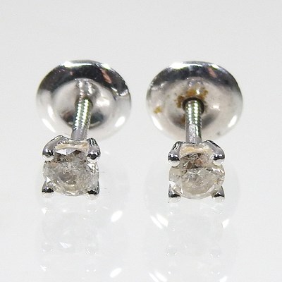 Lot 73 - A pair of 18 carat white gold diamond stud...