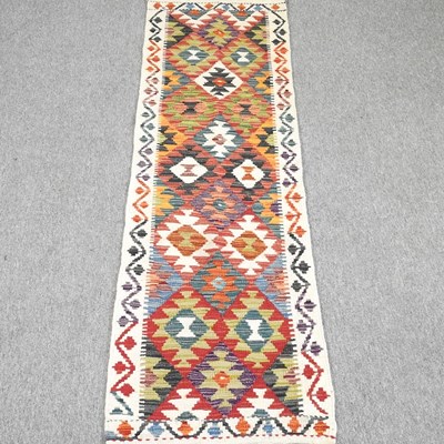 Lot 194 - A kilim runner, with all over diamonds, 193 x...