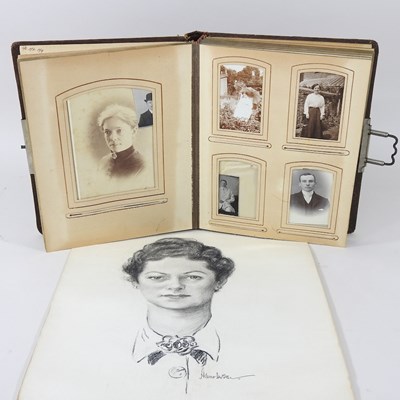 Lot 381 - An early 20th century photograph album,...