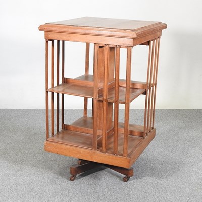 Lot 357 - An early 20th century walnut revolving bookcase