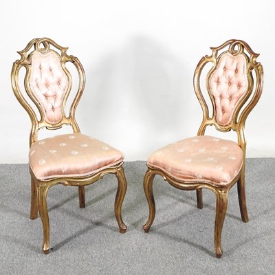 Lot 284 - A pair of gilt side chairs, together with...