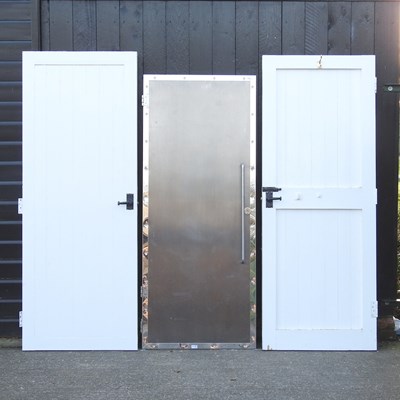 Lot 370 - A chrome effect interior door, 183 x 76cm,...