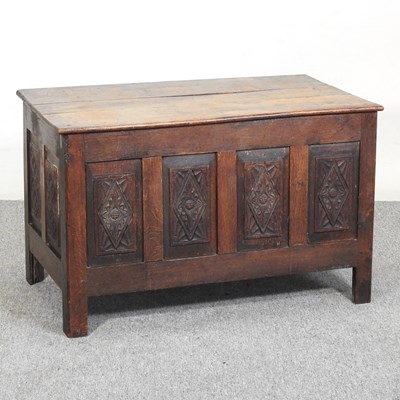 Lot 433 - A 19th century and later carved oak coffer, of...