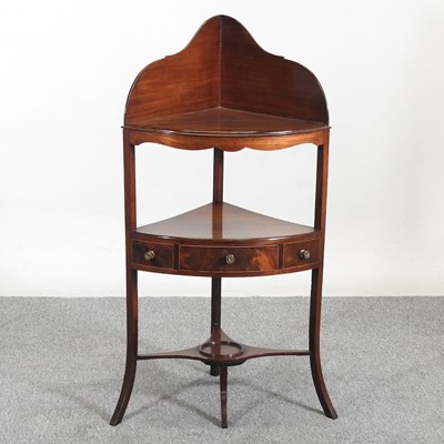 Lot 256 - A Regency mahogany and boxwood strung corner...