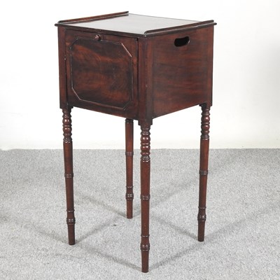 Lot 507 - A Regency mahogany pot cupboard, with a hinged...