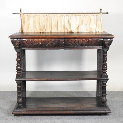 Lot 335 - A 19th century continental carved oak three...