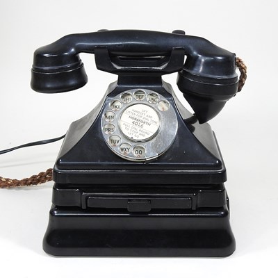Lot 144 - A vintage black bakelite GPO telephone, on...