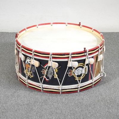 Lot 252 - A painted military drum, decorated with crests...
